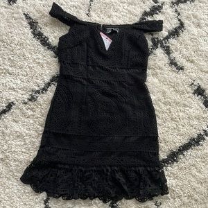 Showpiece brand new black dress with tags size small